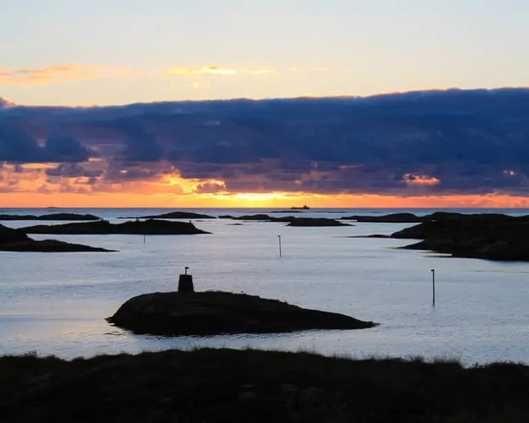 Sunset at sea with many small islands, Norway